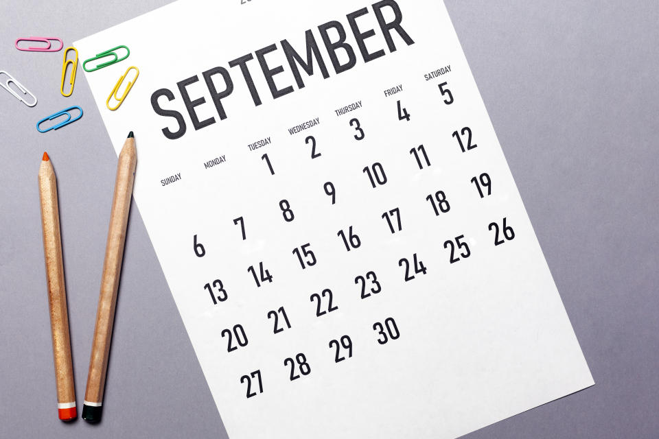 September 2020 simple calendar with office supplies and copy space