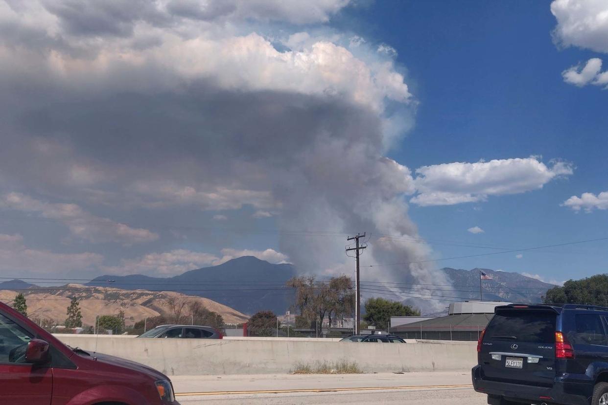 A plume of smoke from the El Dorado Fire is seen from the Interstate 10 in Loma Linda, Calif., Saturday, Sept. 5, 2020: AP