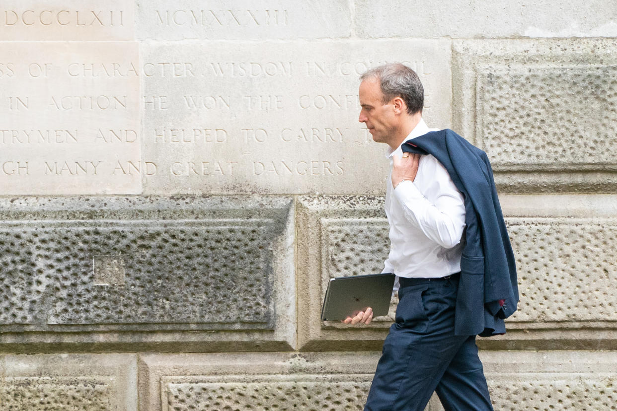 Foreign Secratary Dominic Raab arrives at the Foreign Office in Westminster, London, as he faces mounting pressure to resign after it emerged a phone call requested by his officials to help interpreters flee Afghanistan was not made. Picture date: Friday August 20, 2021. (Photo by Dominic Lipinski/PA Images via Getty Images)