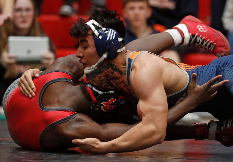 Harrison’s Carlos Perez-Xochipa and Lafayette Jeff’s Daeveon Cheeks compete in the 170 lbs championship during the IHSAA wrestling sectional championship, Saturday, Jan. 28, 2023, at Lafayette Jeff High School in Lafayette, Ind.