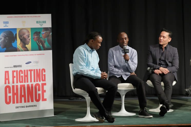 Tsepo Mathibelle (center) speaks during the premiere of the documentary 