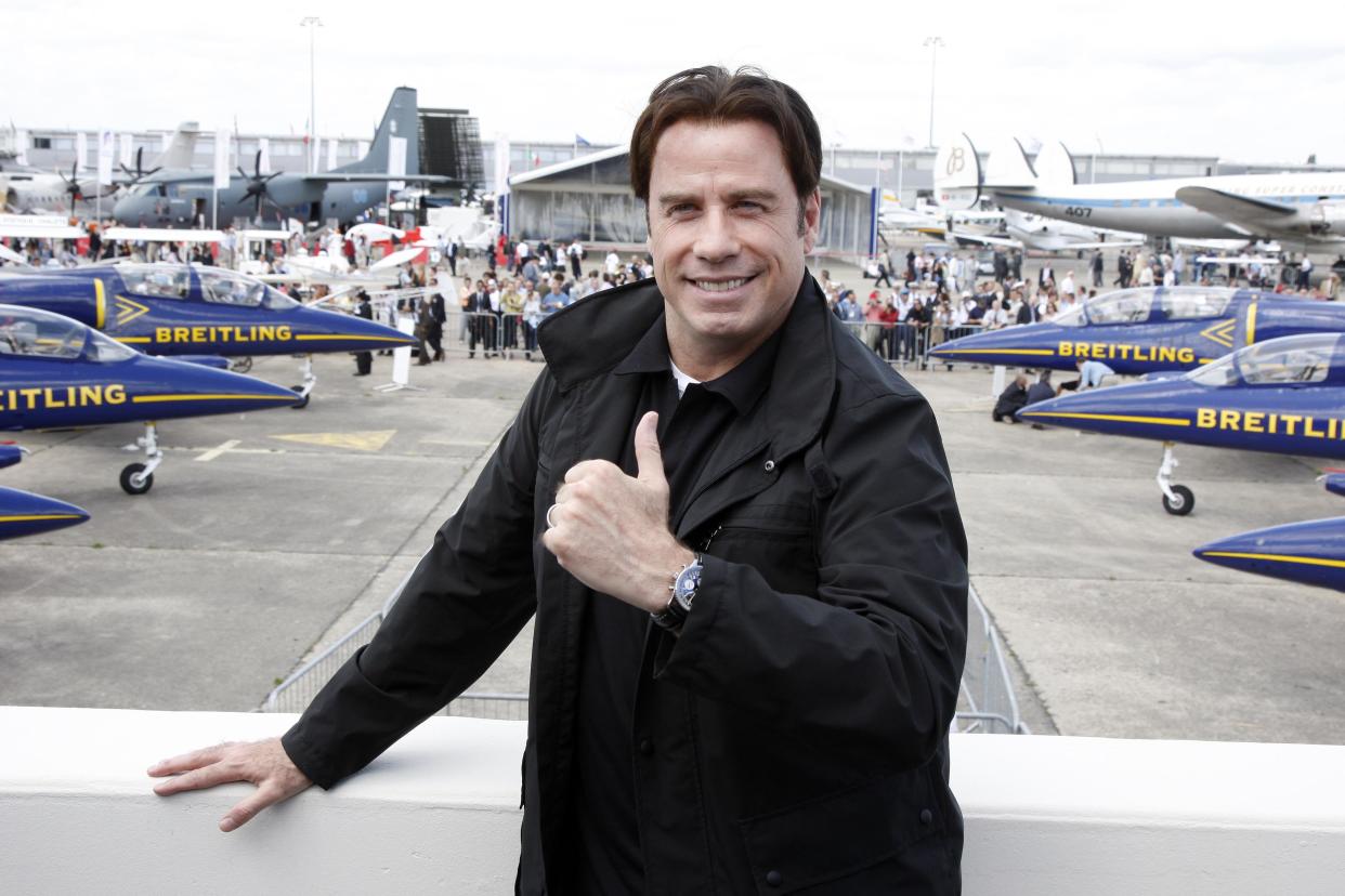 LE BOURGET, FRANCE- JUNE 21:  Hollywood actor and pilot John Travolta attends the 47th International Paris Air Show on June 21, 2007 in Le Bourget France. Travolta, invited by Breitling, witnessed the presentation of Airbus A380 superjumbo and Boeing's F/A-18 fighter jet.  (Photo by Michel Dufour/WireImage)