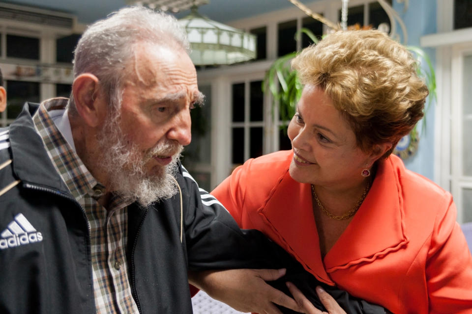 In this photo released by Cubadebate, Brazil's President Dilma Rousseff visits with Cuba's former President Fidel Castro in Havana, Cuba, Monday, Jan. 27, 2014. Rousseff is in Havana to attend the Community of Latin American and Caribbean States summit. (AP Photo/Cubadebate, Alex Castro)