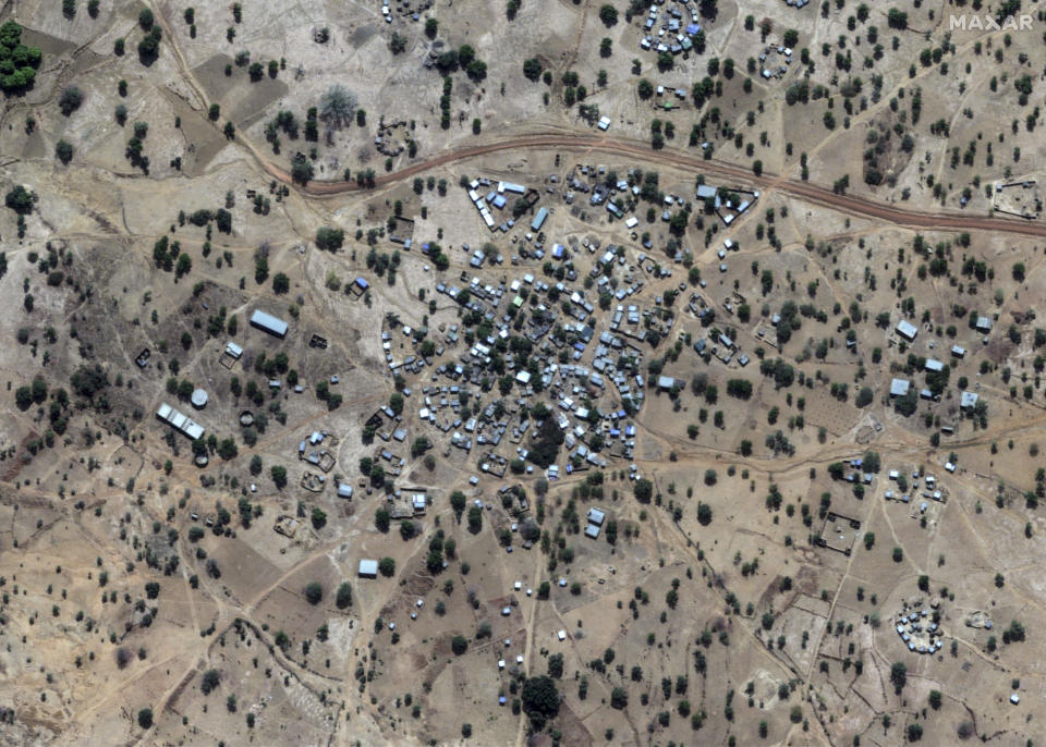 This satellite image provided by Maxar Technologies shows Zaongo village in Burkina Faso on Dec. 30, 2023. Three survivors of an attack in Zaongo told AP that dozens of people were killed in their village on Nov. 5 when security forces attacked. One of the survivors, a 32-year-old farmer, said he photographed the horrific scenes of bodies as proof of the carnage before fleeing. (Maxar Technologies via AP)