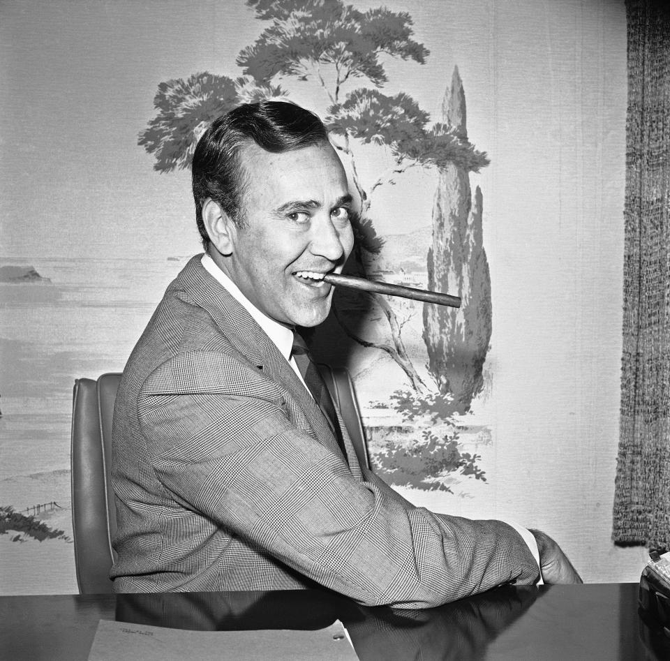 FILE - In this May 25, 1967 file writer-comedian Carl Reiner poses in his new hairpiece in Los Angeles. Reiner, the ingenious and versatile writer, actor and director who broke through as a “second banana” to Sid Caesar and rose to comedy’s front ranks as creator of “The Dick Van Dyke Show” and straight man to Mel Brooks’ “2000 Year Old Man,” has died, according to reports. Variety reported he died of natural causes on Monday night, June 29, 2020, at his home in Beverly Hills, Calif. He was 98. (AP Photo/Harold Filan, File)