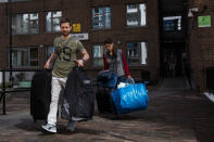 <p>Residents leave their home on the Taplow Block on the Chalcots Estate on June 26, 2017 in London, England. Residents of the Chalcots Estate have been urged to leave their homes due to fire safety fears in the wake of the Grenfell Tower tragedy. Four of the five Chalcots Estate towers in Camden, North London, are being evacuated after they were found to have similar cladding to that on Grenfell, attributed to contributing to the rapid spread of the blaze last week that killed at least 79 people (Photo: Dan Kitwood/Getty Images) </p>