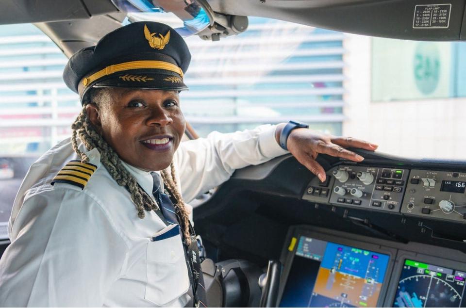 Captain Theresa Claiborne sits in the cockpit of the Boeing 787-10 on May 20, the day of her retirement from United Airlines.  Her last flight was from Newark to Lisbon.