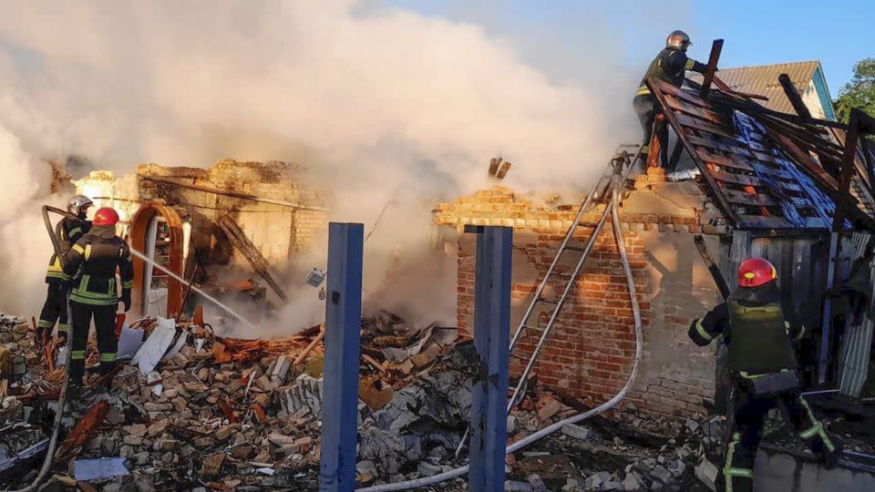 Rescuers assess the ruins of a building, damaged by a Russian missile attack in Kyiv region, Ukraine on May 8, 2024. - Handout/Ukrainian Emergency Service/AP