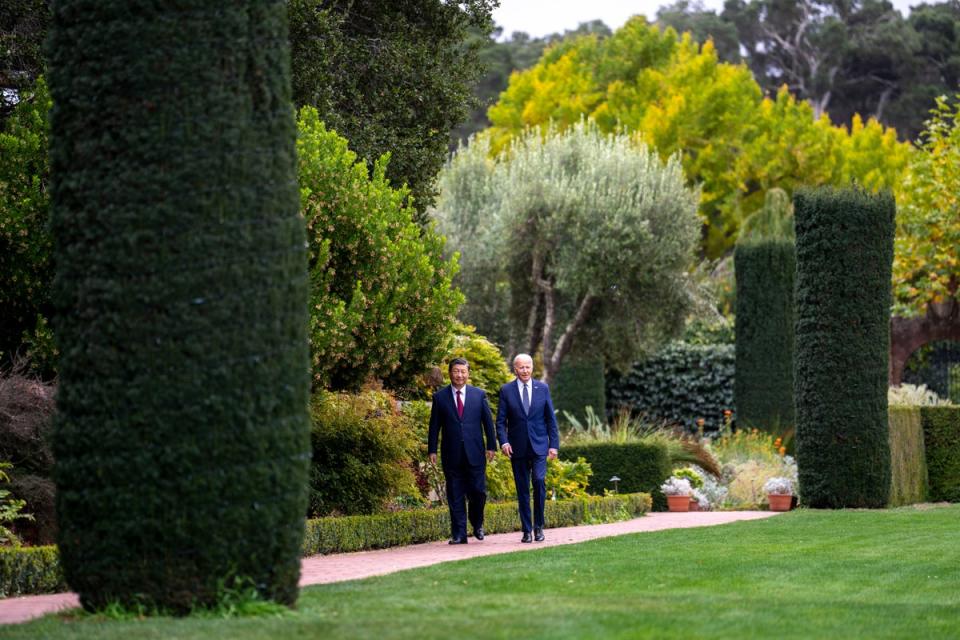 President Joe Biden and China's President Xi Jinping walk in the gardens at the Filoli Estate in Woodside, California on November 15, 2023, on the sidelines of the Asia-Pacific Economic Cooperative conference (New York Times)