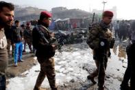 Iraqi security forces inspect the site of a car bomb attack at a vegetable market in eastern Baghdad, Iraq, January 8, 2017. REUTERS/Wissm al-Okili