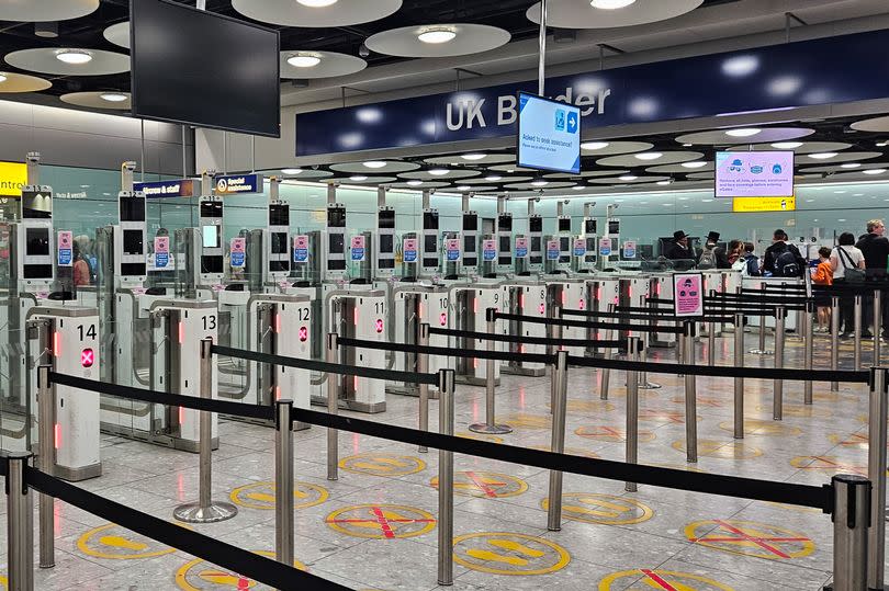 Empty queuing lanes at the electronic gates at the UK Border checkpoint, following a glitch in the electronic gate system, at London Heathrow Airport, in London, UK, on Tuesday, May 7, 2024. Immigration officers were forced to manually process incoming passengers. Photographer: