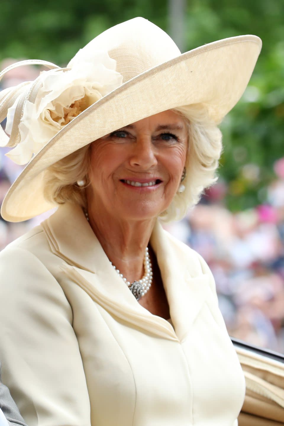 <p>Camilla, Duchess of Cornwall went for an off-white coat and matching hat.</p>