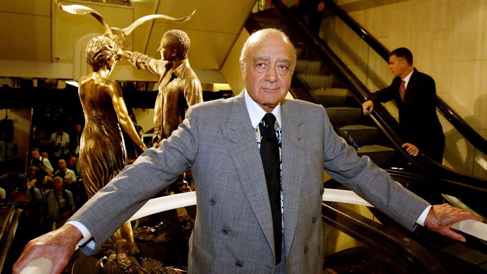 Al Fayed unveils a memorial to his son Dodi and Britain's Diana Princess of Wales at Harrods in London in 2005. - Paul Hackett/Reuters