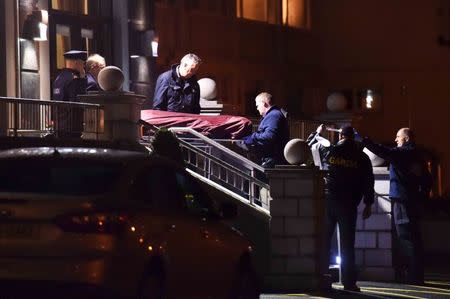 Police remove a body from the scene of a shooting at the Regency Hotel in Dublin, Ireland in this February 5, 2016 file photo. REUTERS/Clodagh Kilcoyne/Files