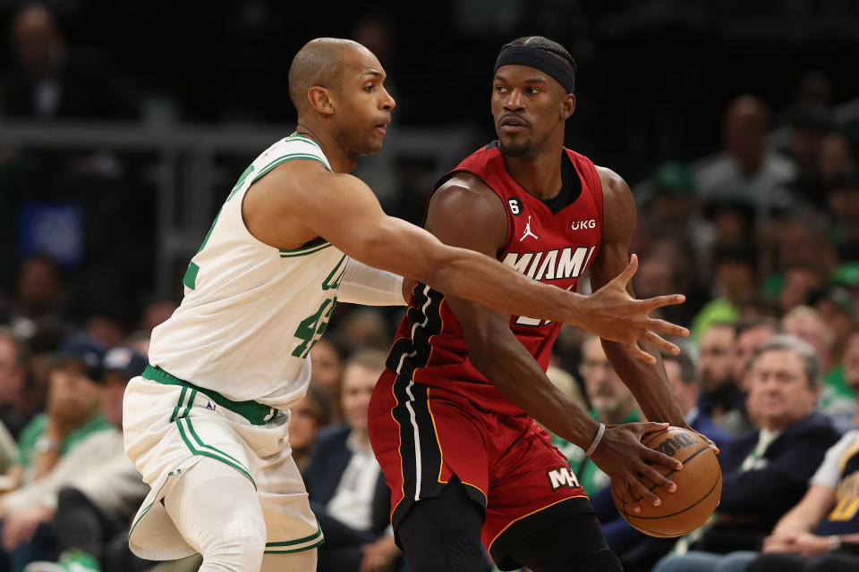 Jimmy Butler of the Miami Heat is defended by Al Horford of the Boston Celtics during Game 1 of the Eastern Conference finals at TD Garden in Boston on May 17, 2023. (Adam Glanzman/Getty Images)