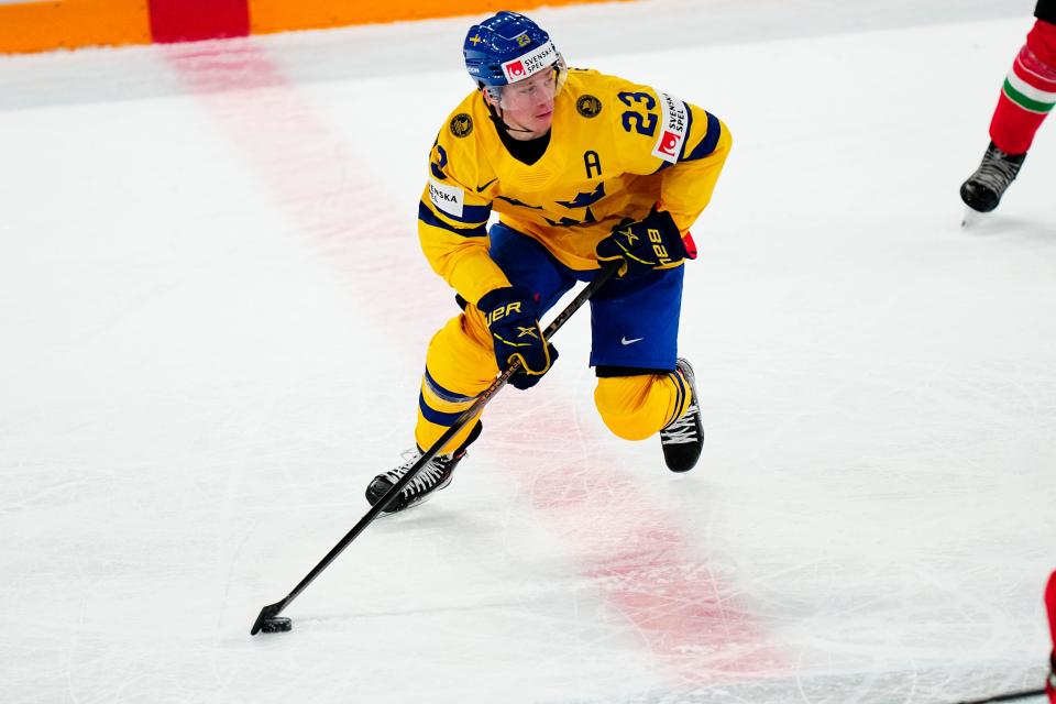 Sweden's Lucas Raymond controls the puck during the Group A match against Hungary at the World Championship in Tampere, Finland, on Thursday, May 18, 2023.