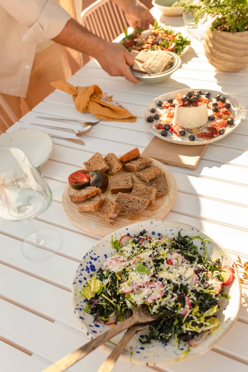 Dinner on outdoor dining table.