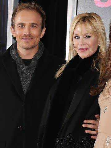 <p>Krista Kennell/Variety/Penske Media/Getty</p> Jesse Johnson and Melanie Griffith at a 'How to be Single' screening on Feb. 3, 2016