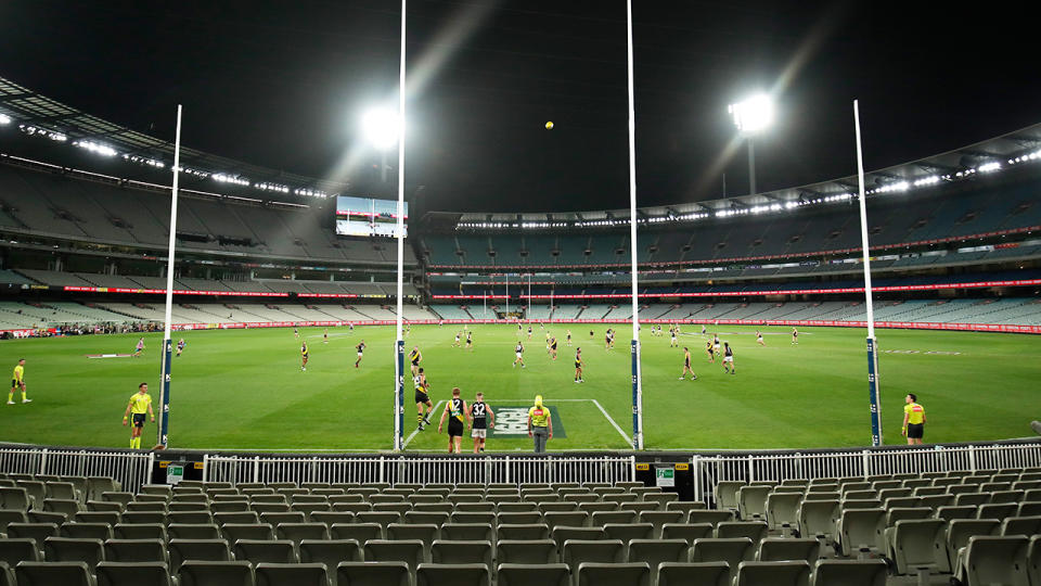 The AFL season, pictured here starting behind closed doors at the MCG.