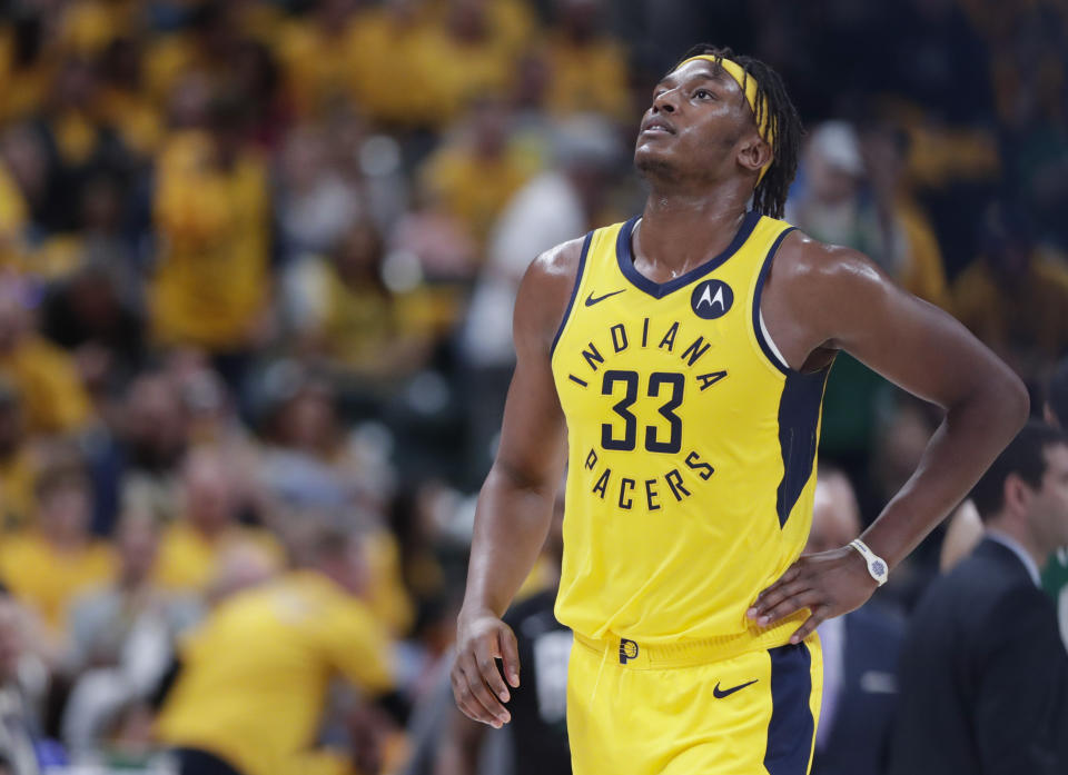 Indiana Pacers center Myles Turner (33) walks back to the bench for a timeout during the second half of Game 4 against the Boston Celtics in an NBA basketball first-round playoff series in Indianapolis, Sunday, April 21, 2019. The Celtics defeated the Pacers 110-106 to win the series 4-0. (AP Photo/Michael Conroy)