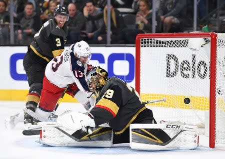 Feb 9, 2019; Las Vegas, NV, USA; Columbus Blue Jackets right wing Cam Atkinson (13) shoots a rebound past Vegas Golden Knights goaltender Marc-Andre Fleury (29) for a goal during the third period at T-Mobile Arena. Mandatory Credit: Stephen R. Sylvanie-USA TODAY Sports