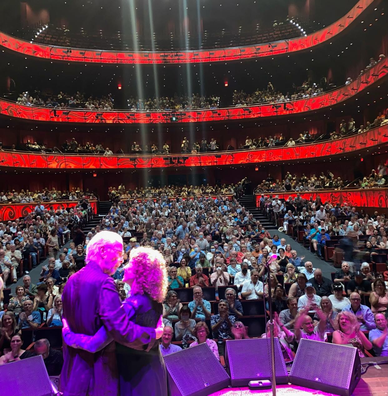 Legendary jazz artists Herb Alpert and Lani Hall embrace at a San Antonio performance in 2022.