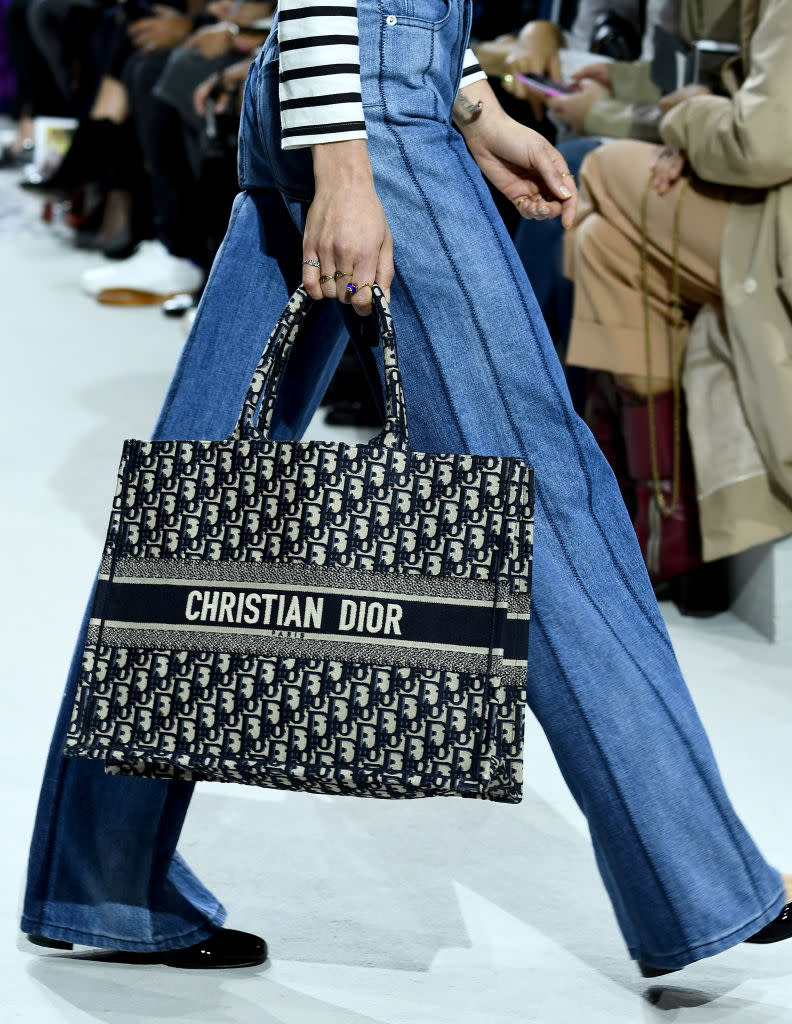 Noughties-style logo bags are big news this season [Photo: Getty]