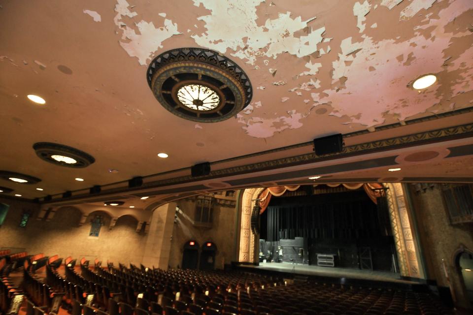 Paint peels from the ceiling under the balcony seating area of the Florida Theatre on Tuesday, June 27, 2023.