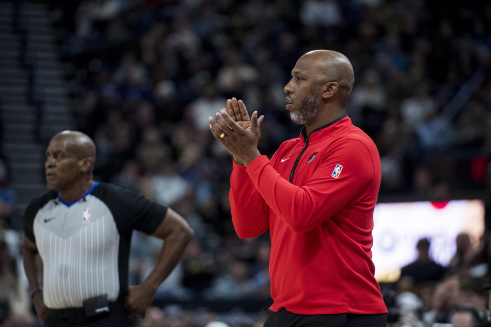 Portland Trail Blazers coach Chauncey Billups applauds after a play against the Utah Jazz during the first half of an NBA basketball game Saturday, Dec. 2, 2023, in Salt Lake City. (AP Photo/Isaac Hale)