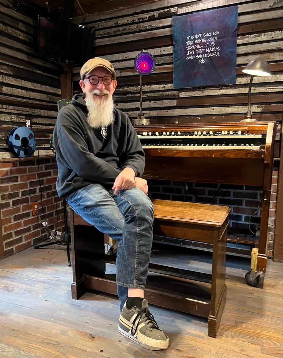 Ron Flack, owner of Realgrey Records, is shown inside Our Carriage House Recording Studio in Canton. Realgrey will hold an open house from 2 to 8 p.m. Sunday marking the addition of a new recording room.