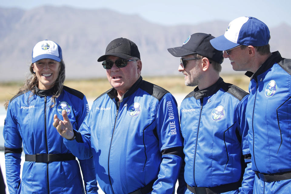 Star Trek actor William Shatner, 90, speaks to the news media with Audrey Powers, Blue Origin's vice president of mission and flight operations and a former NASA flight controller and engineer; Chris Boshuizen, the co-founder of satellite company Planet Labs and a former space mission architect for NASA; and Glen de Vries, the co-founder of Medidata Solutions, a life science company, after their flight in a capsule powered by Blue Origin's reusable rocket engine New Shepard  on a landing pad  near Van Horn, Texas, U.S., October 13, 2021. REUTERS/Mike Blake