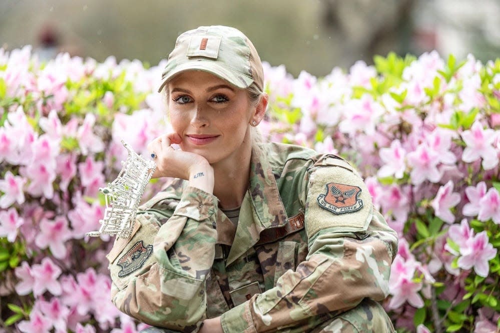 Madison Marsh, wearing her military uniform, poses with her Miss America crown.