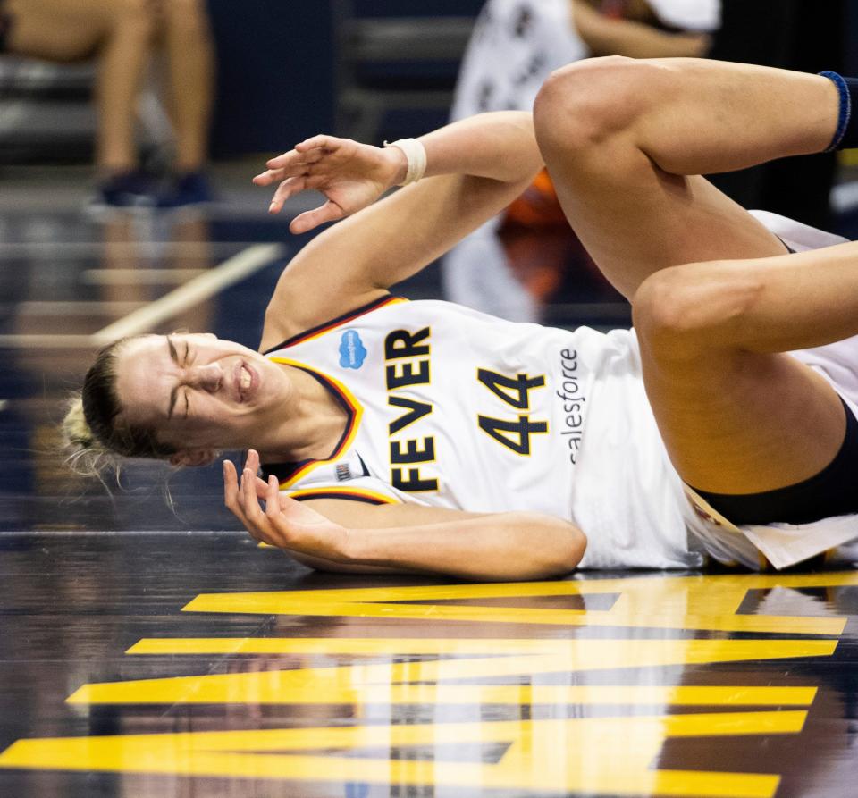 Indiana Fever center Bernadett Hatar hits the floor Thursday, July 1, 2021, in Indianapolis.