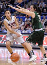 Connecticut's Bria Hartley, left, is guarded by South Florida's Laura Marcos Canedo (31) during the first half of an NCAA college basketball game in Hartford, Conn., Sunday, Jan. 26, 2014. (AP Photo/Fred Beckham)