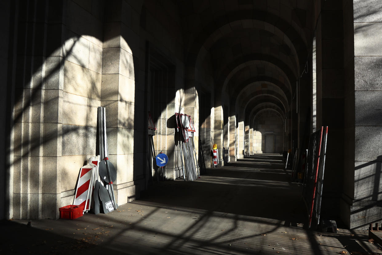 Traffic signs are stacked inside the 'Congress Hall' at the 'Reichsparteigelande' (Nazi Party Rally Grounds) in Nuremberg, Germany, Wednesday, Nov. 18, 2020. Germany marks the 75th anniversary of the landmark Nuremberg trials of several Nazi leaders and in what is now seen as the birthplace of a new era of international law on Friday, Nov. 20, 2020. (AP Photo/Matthias Schrader)