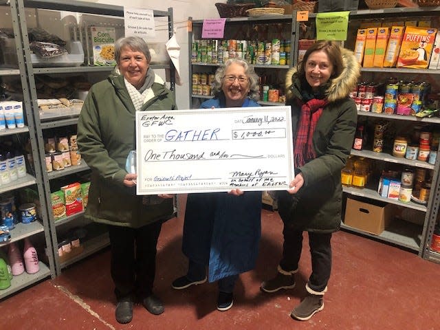 Denise Raisanen, GFWC NH Vice President; Mary Ryan, Exeter Area GFWC; and Jeanne O'Sullivan, GFWC NH President, all members of the Exeter Area GFWC, recently presented the club's donation of $1,000 to Gather food pantry.