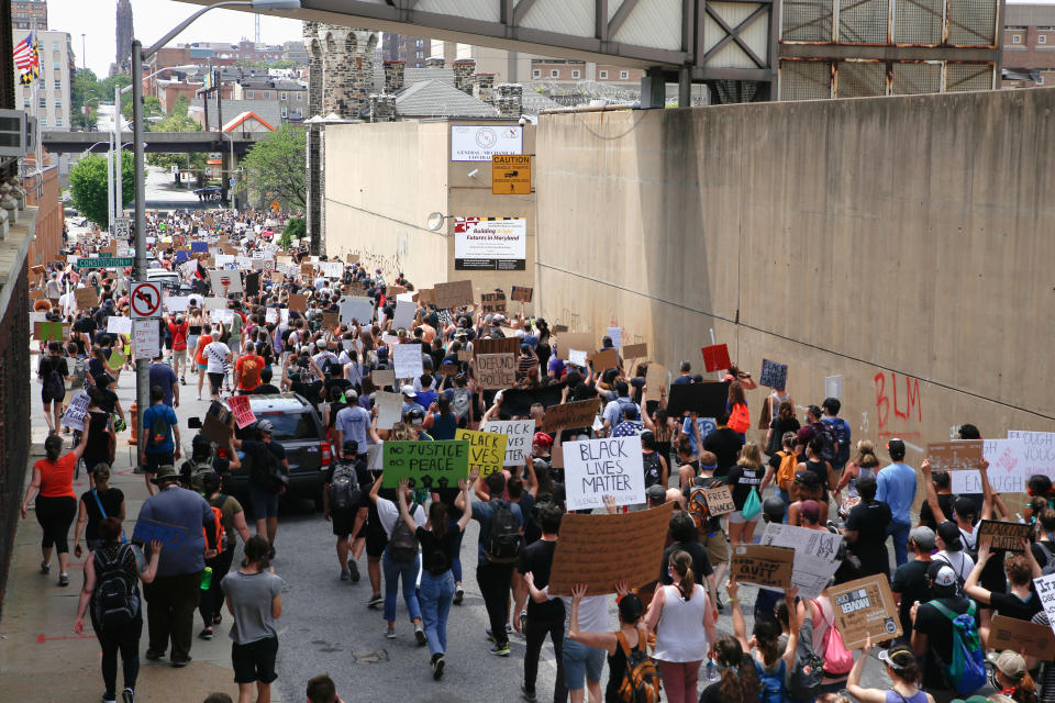 People rally during a protest against the death in Minneapolis police custody of George Floyd in front of the Baltimore City Correctional Center, Maryland, U.S., June 6, 2020. (Rosem Morton/Reuters)