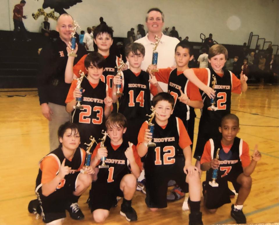 Will Reichard (back right) on a youth basketball team.