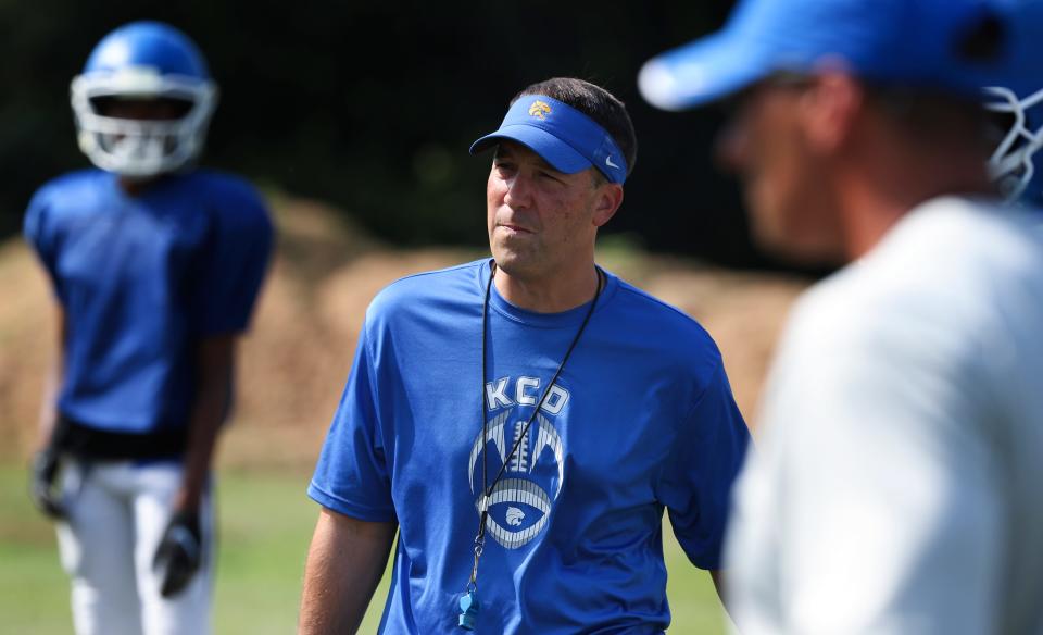 Kentucky County Day head coach Matthew Jones, center, watches practice at the school in Louisville, Ky. on Aug. 4, 2021.  