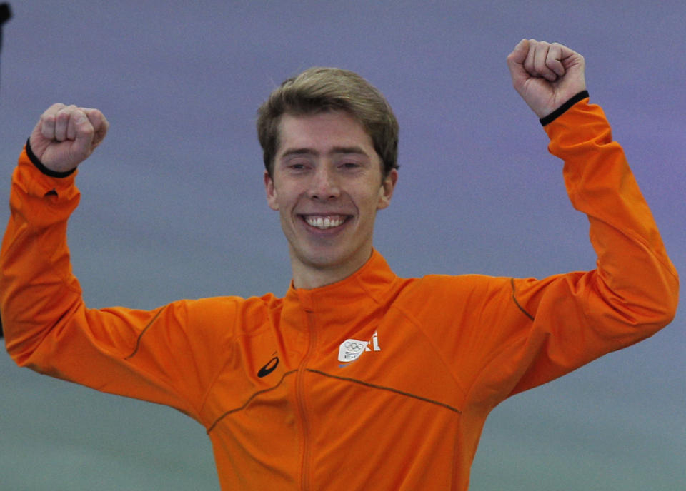 Gold medallist Jorrit Bergsma of the Netherlands celebrates after the final race in the men's 10,000-meter speedskating race at the Adler Arena Skating Center during the 2014 Winter Olympics in Sochi, Russia, Tuesday, Feb. 18, 2014. (AP Photo/Peter Dejong)