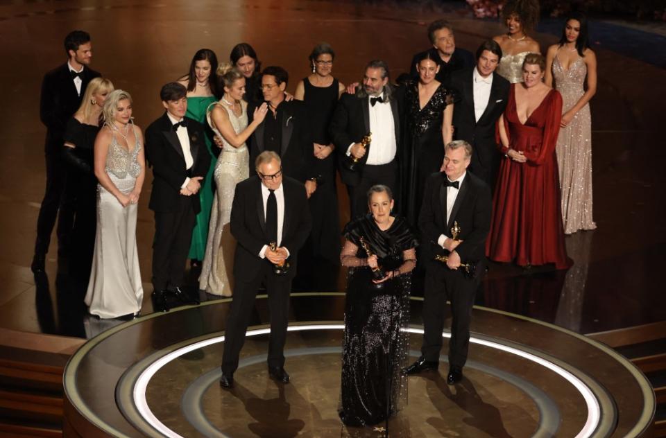 Director Christopher Nolan and producers Emma Thomas and Charles Roven won the Oscar for Best Picture for “Oppenheimer” during the Oscars. REUTERS/Mike Blake