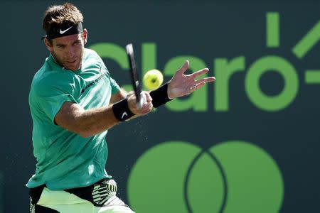 Mar 27, 2017; Miami, FL, USA; Juan Martin del Potro of Argentina hits a forehand against Roger Federer of Switzerland (not pictured) on day seven of the 2017 Miami Open at Crandon Park Tennis Center. Mandatory Credit: Geoff Burke-USA TODAY Sports