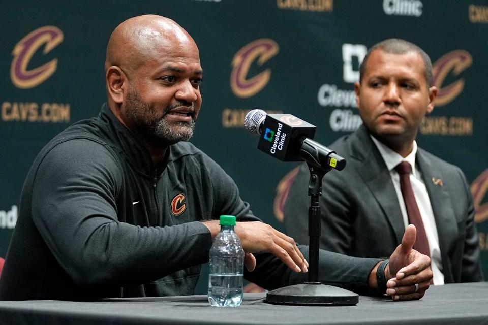 Cavaliers coach J.B. Bickerstaff, left, answers a question during a news conference at media day, Monday, Oct. 2, 2023, in Cleveland. At right is Cavaliers President of Basketball Operations Koby Altman.