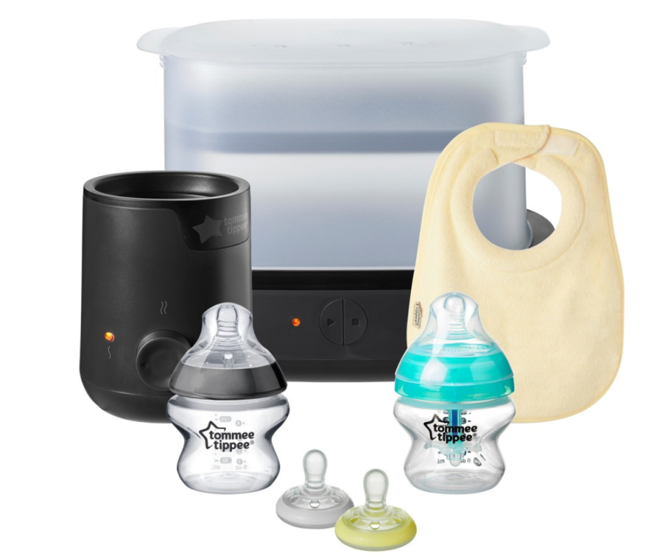 Big W's Tommee Tippee's starter kit on a white background featuring two bottles, two soothers, a bib, a black bottle and food cooler and a steriliser at the back