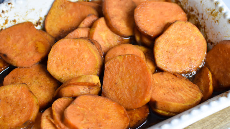 Candied yams in white dish