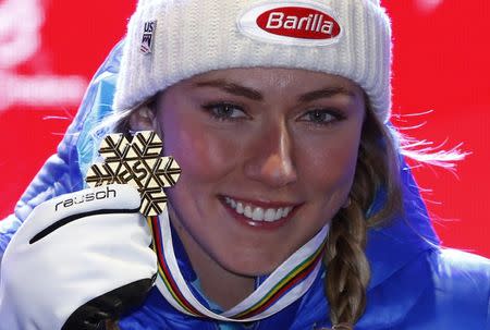 Alpine Skiing - FIS Alpine Skiing World Championships - Women's Slalom - St. Moritz, Switzerland - 18/2/17 - Mikaela Shiffrin of the USA poses with her gold medal. REUTERS/Ruben Sprich