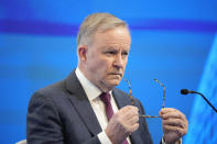 Australian Prime Minister Anthony Albanese looks on before deliver keynote address during the opening dinner for the 20th International Institute for Strategic Studies (IISS) Shangri-La Dialogue, Asia's annual defense and security forum, in Singapore, Friday, June 2, 2023. (AP Photo/Vincent Thian)