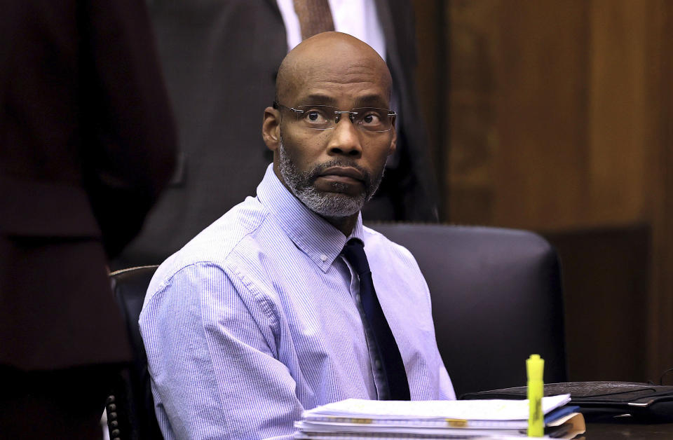 Lamar Johnson takes a seat in court at the start of his wrongful conviction hearing in St. Louis on Monday, Dec. 12, 2022. (David Carson/St. Louis Post-Dispatch via AP, Pool)