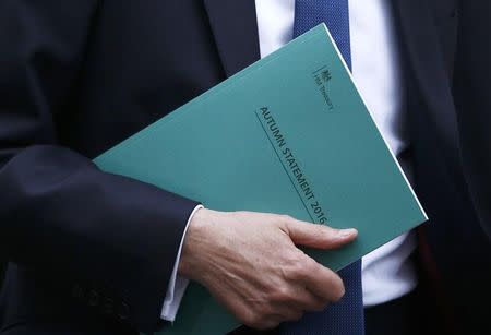 Britain's Chancellor of the Exchequer Philip Hammond leaves 11 Downing Street on his way to present his Autumn Statement in the House of Commons, in London November 23, 2016. REUTERS/Peter Nicholls