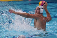 United States' Marko Vavic (3) shoots against Italy during a preliminary round men's water polo match at the 2020 Summer Olympics, Thursday, July 29, 2021, in Tokyo, Japan. (AP Photo/Mark Humphrey)